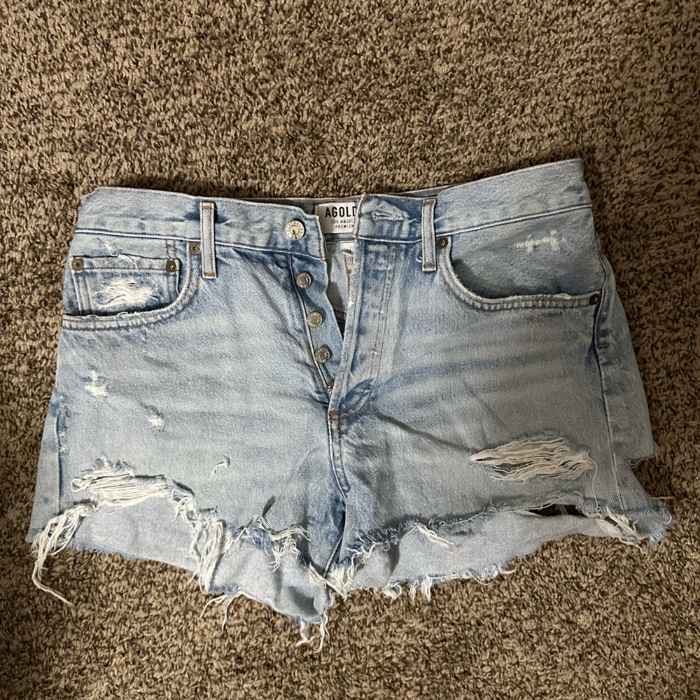 Distressed Light wash jean shorts. Agolde. Size 28